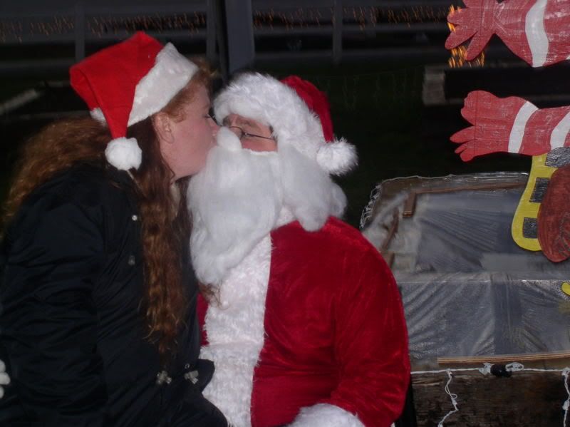 mama kissing santa claus