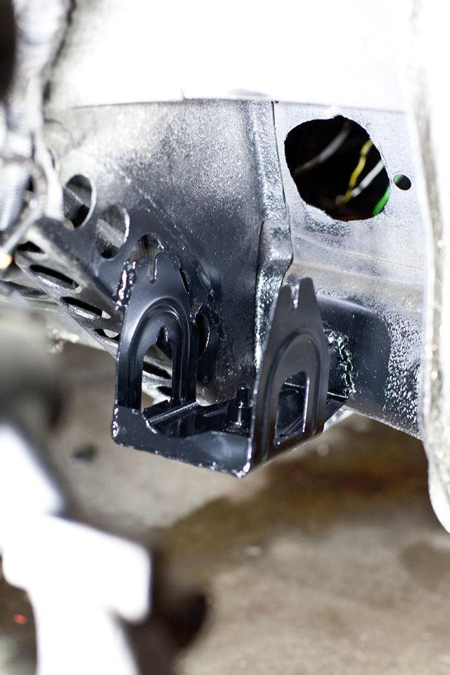 The OEM mount was used, and welded directly to the chassis.