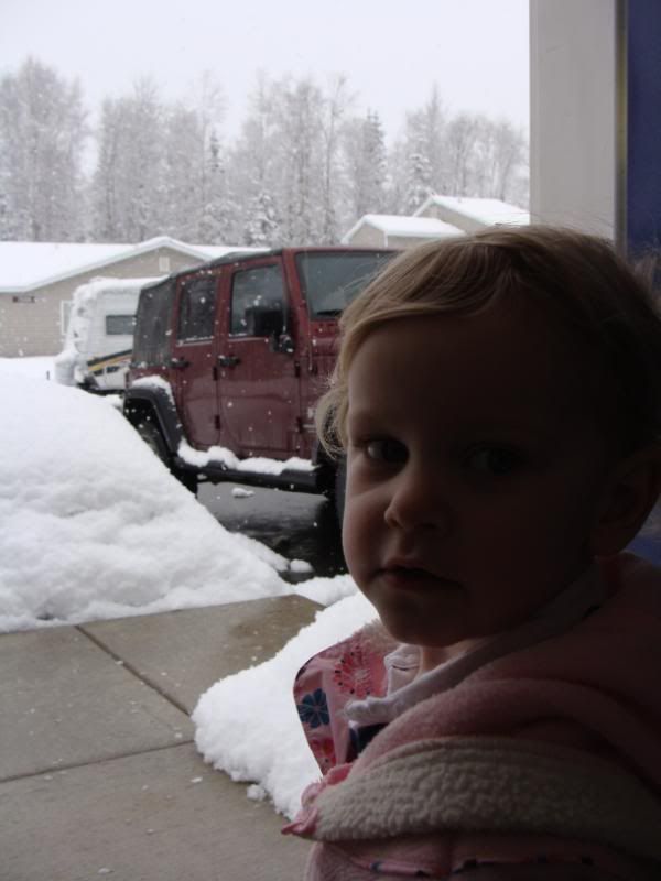 Autumn checking out the snow