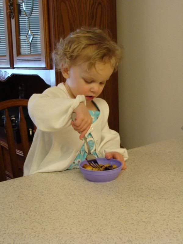 Digging into blue berry pie