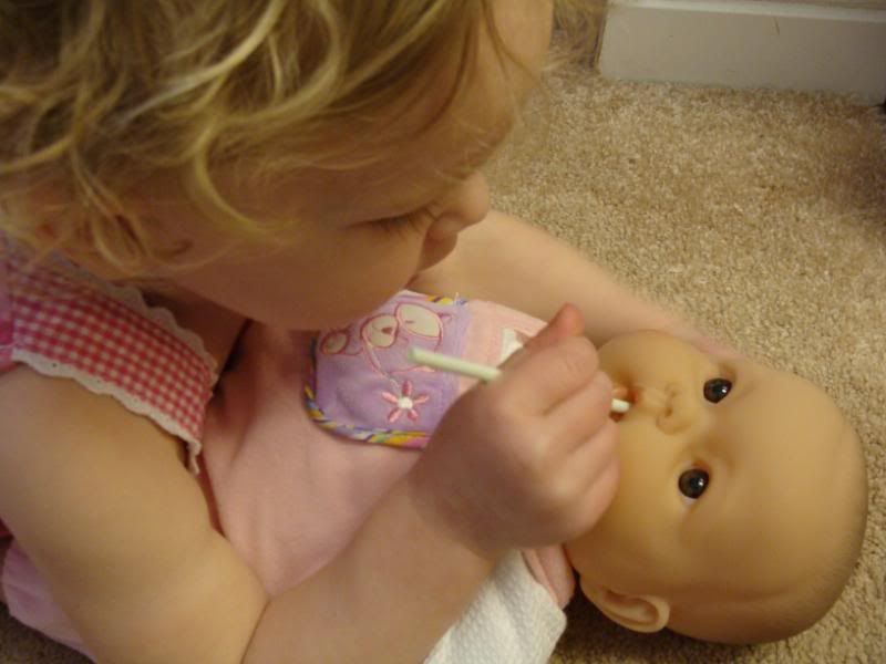 Shoving things in baby mouth