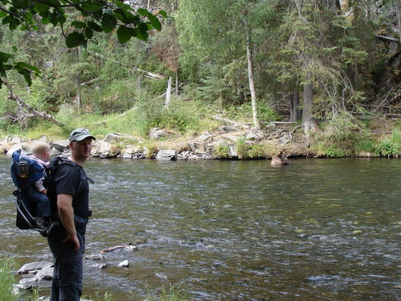 Sean closing his eyes to a brown bear