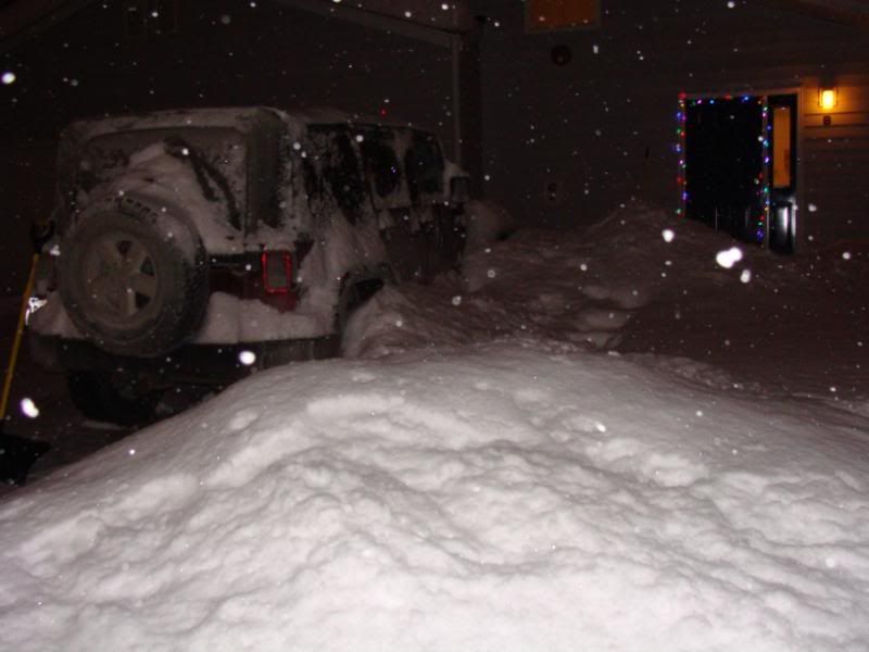 The Jeep is getting buried.