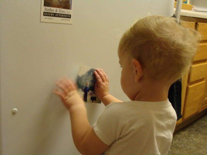 Putting your pic on the fridge.