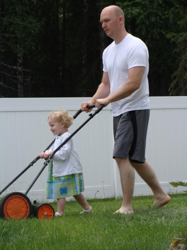 Sean and Autumn mowing