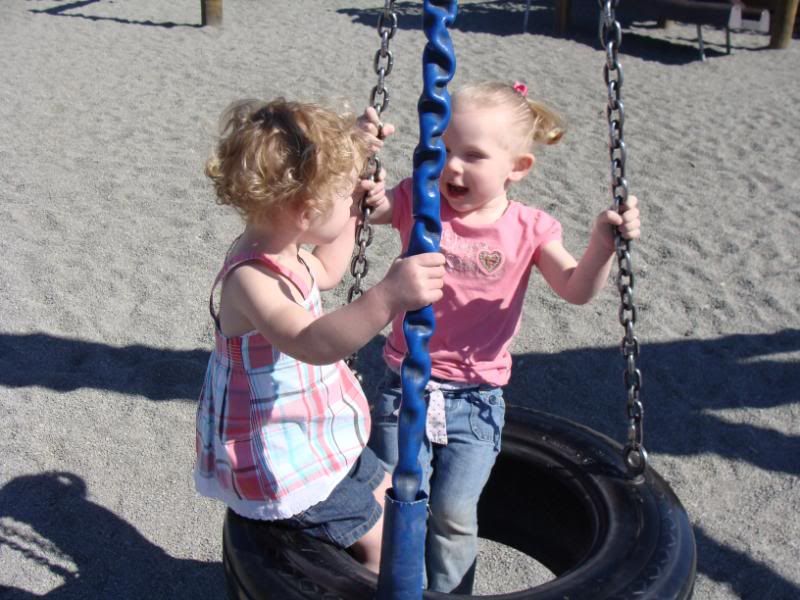 Making friends on the tire swing