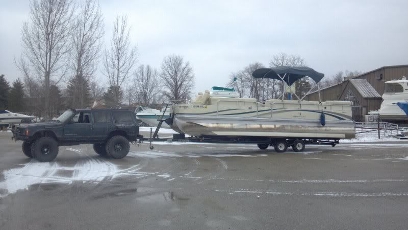 Jeep pulling pontoon boat #5