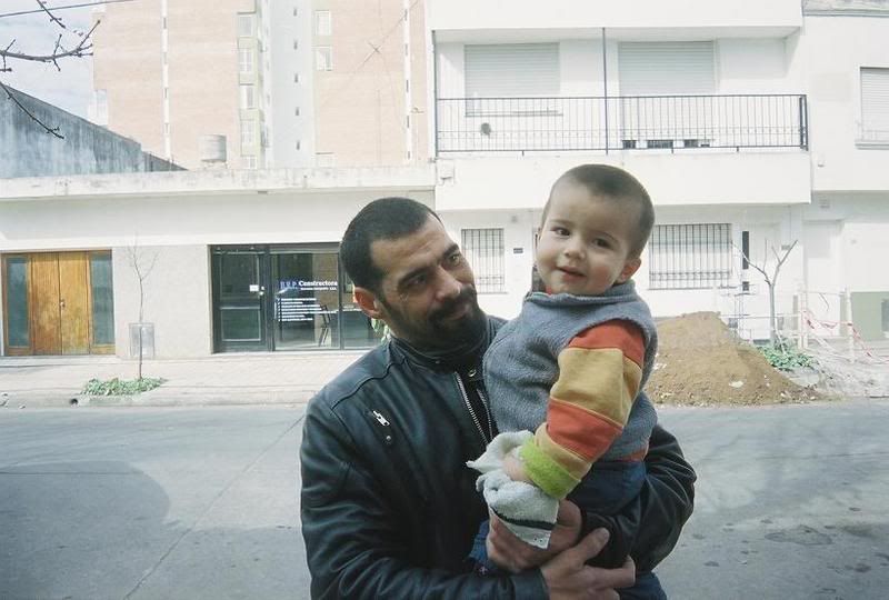 My baby with his photo 0447673-R1-010-3A.jpg